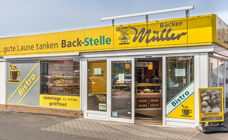 Bäcker Müller Standort-Typ: Freistehend. Eine freistehende Bäckerei-Filiale.